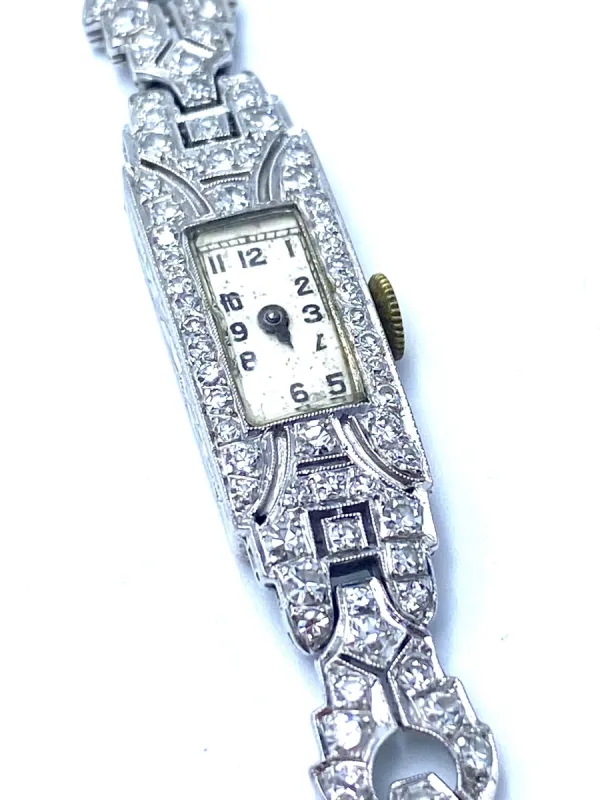 Montre-bracelet Art Déco, or blanc et diamants sold by 58 Facettes