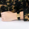 HERMES - Bracelet charnière modèle large plaqué or rose et émail noir sold by 58 Facettes