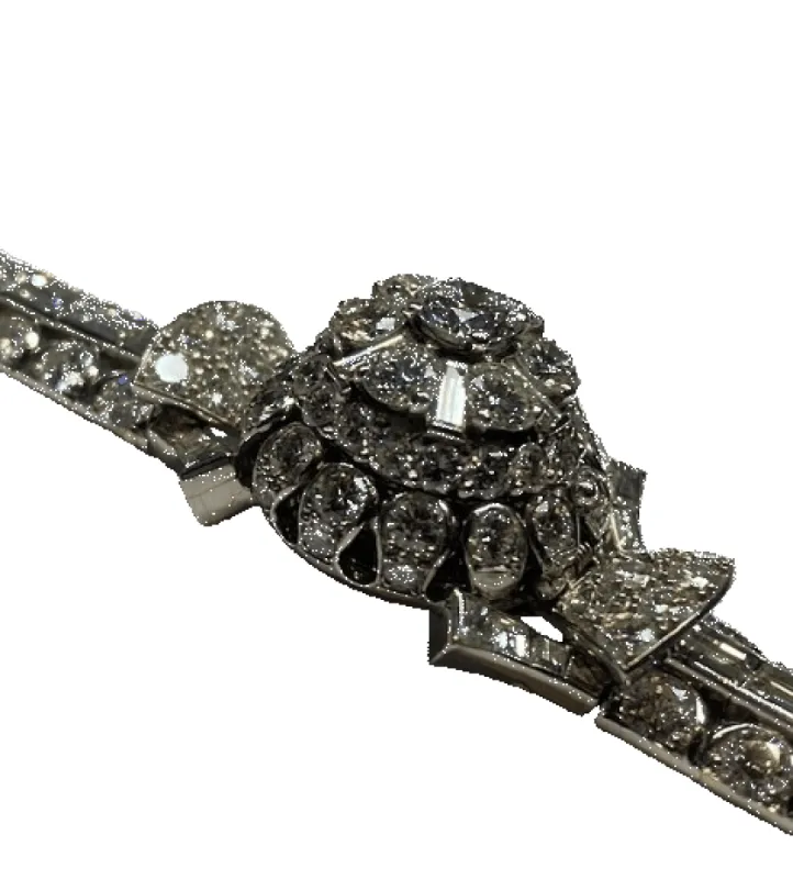 Montre bracelet platine or jaune pavage diamants sold by 58 Facettes