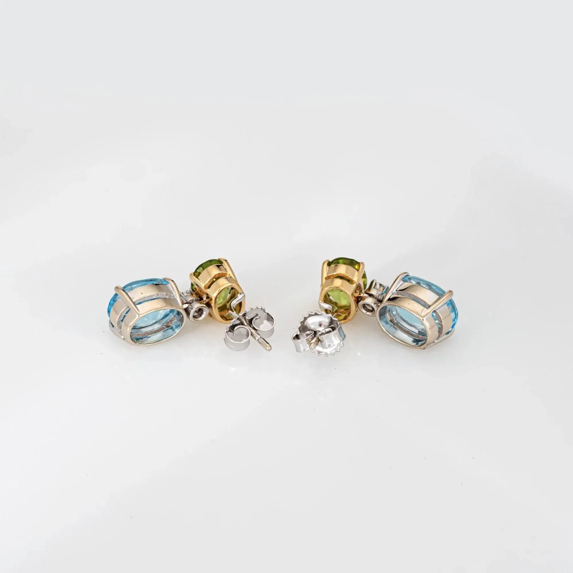 Boucles d'oreilles pendantes en or 18k, péridot, topaze bleue et diamants sold by 58 Facettes product image thumbnail 4