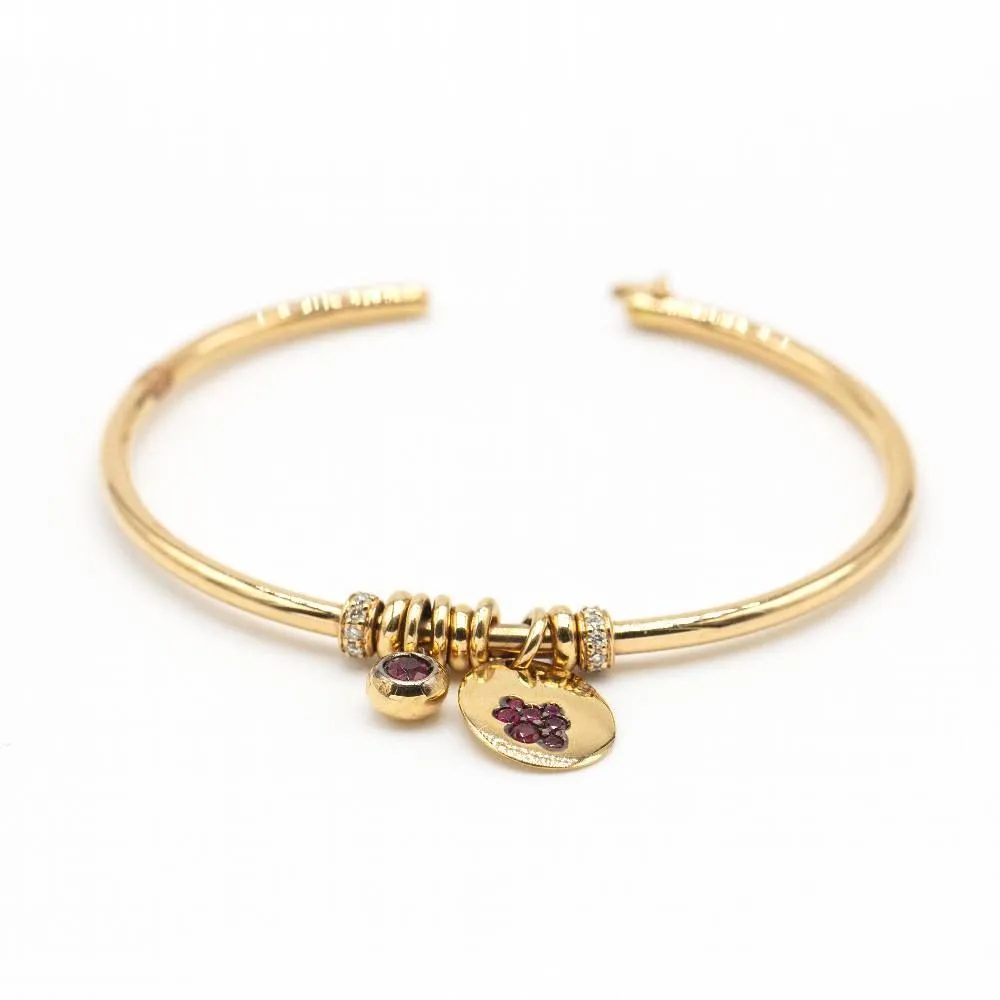Bracelet en or jaune, diamants et rubis sold by 58 Facettes