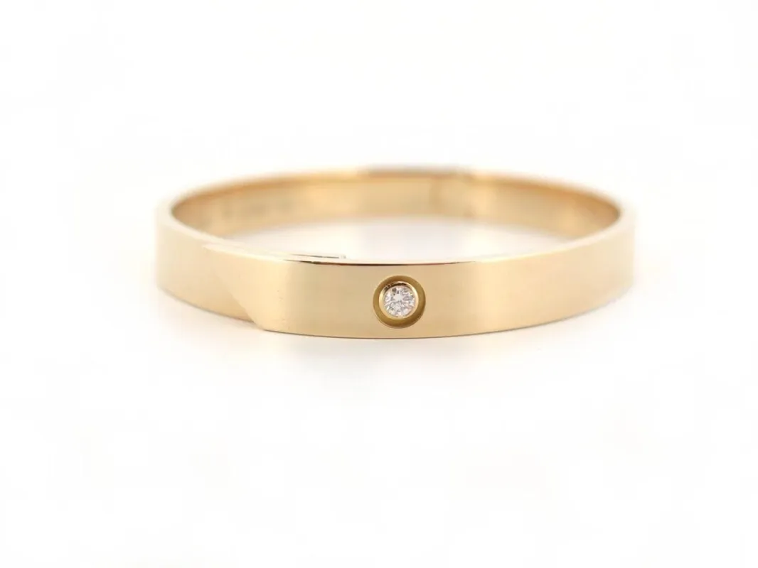 CARTIER - Bracelet Jonc Love Anniversary Or Jaune Diamant sold by 58 Facettes