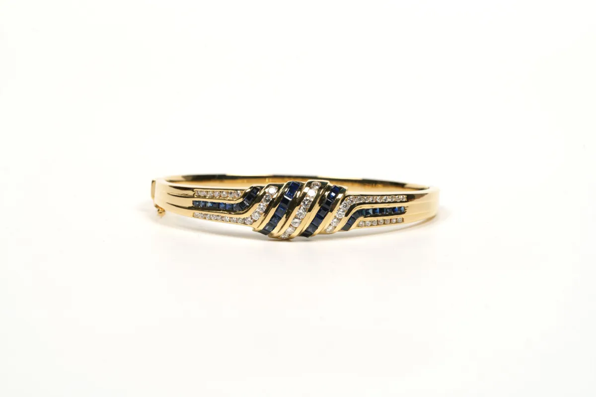 Bracelet contemporain or jaune, saphirs, diamants sold by 58 Facettes