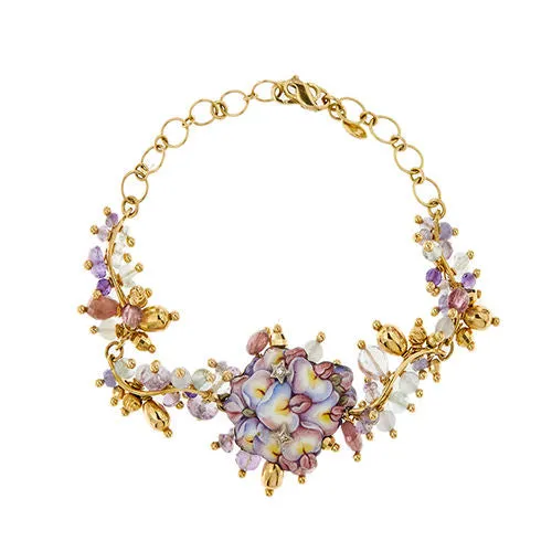 Bracelet fleurs émaillées, diamants et pierres précieuses sold by 58 Facettes