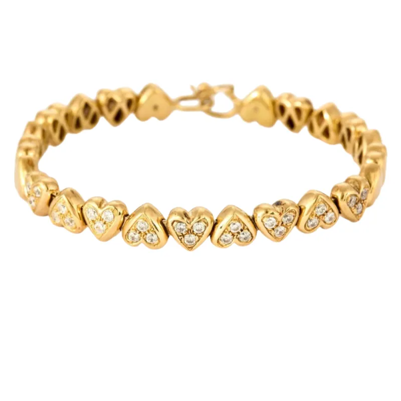 Bracelet jonc "Cœurs" en or jaune et diamants sold by 58 Facettes