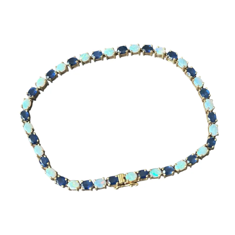 Bracelet or jaune, saphirs et opales sold by 58 Facettes