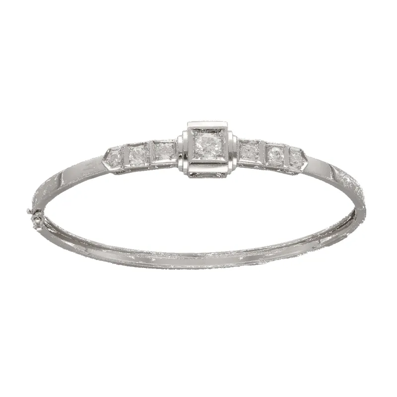 Bracelet Art Déco Platine jonc ouvrant avec diamants, vers 1930 sold by 58 Facettes