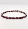 Bracelet tennis or blanc rubis et diamants sold by 58 Facettes