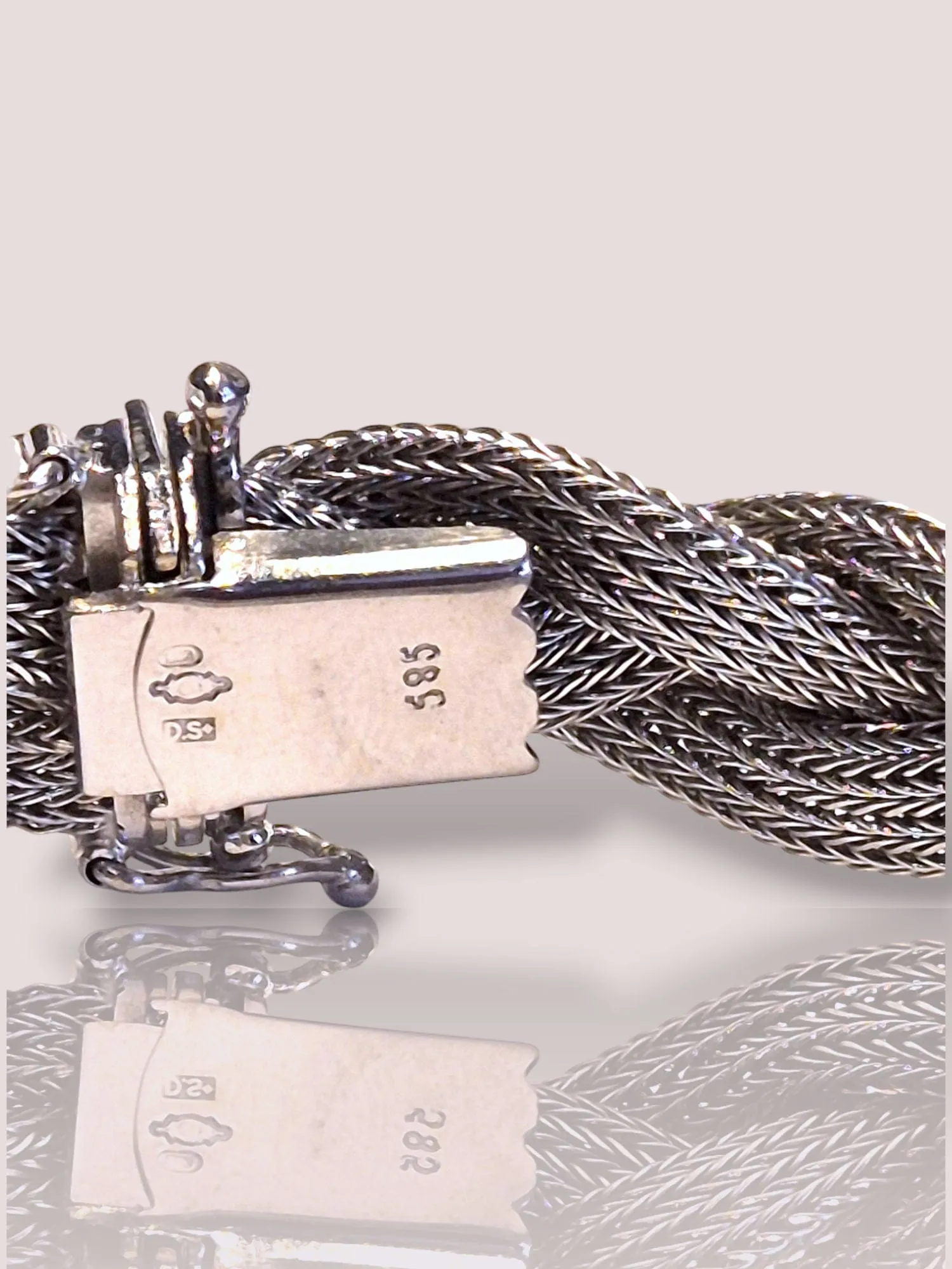 Bracelet tressé en or blanc 14 carats sold by 58 Facettes product image thumbnail 3