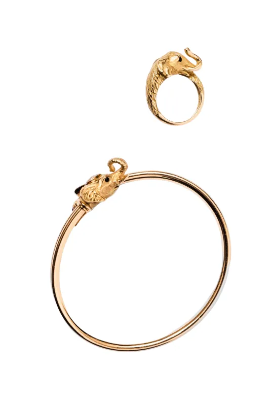Bracelet JEAN ET PIERRE BELLIN Éléphant double jonc ouvert en or jaune, saphir, onyx et diamants sold by 58 Facettes