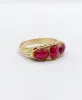 Bague jarretière Art Déco or jaune ornée de 2,43 carats de cabochons de rubis et diamants sold by 58 Facettes