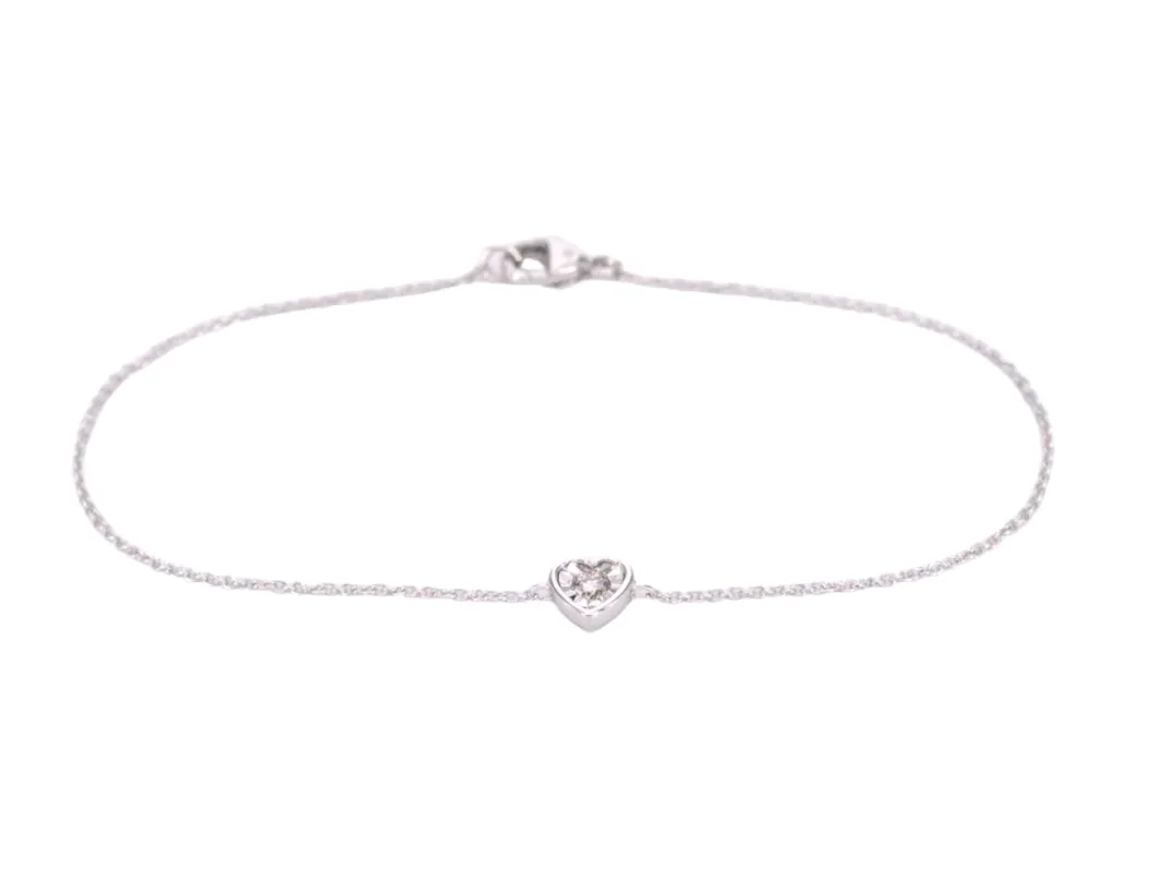 Bracelet en or blanc avec cœur en diamant 0,10 carat sold by 58 Facettes