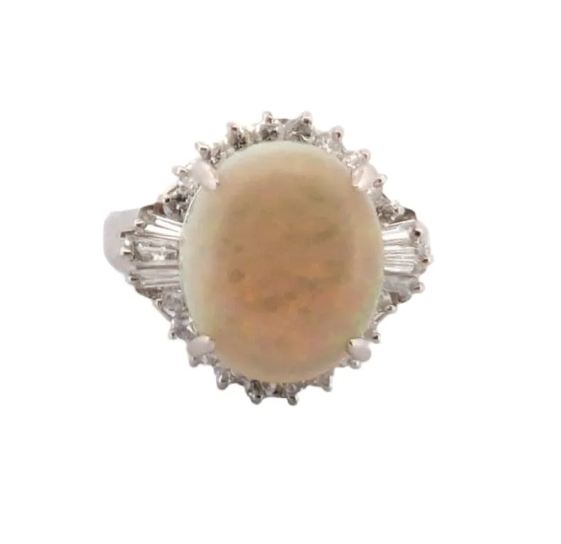 Bague en platine avec opale éthiopienne et diamants sold by 58 Facettes