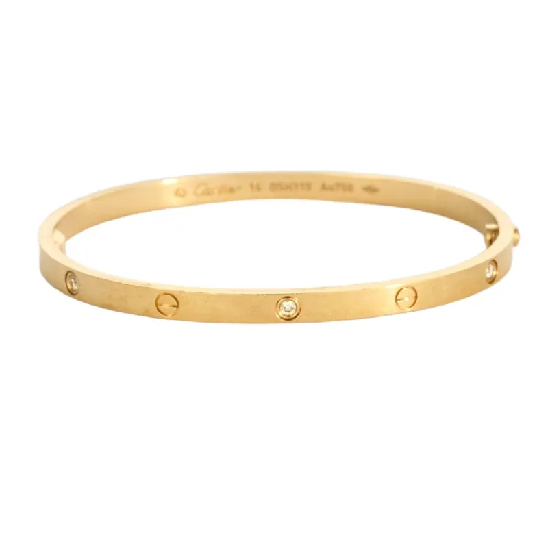 CARTIER - LOVE - Petite modèle  Bracelet or jaune et six  diamants sold by 58 Facettes