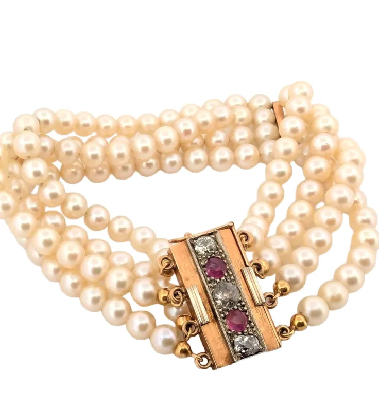 Important bracelet avec fils de perles, rubis et diamants et support en or massif sold by 58 Facettes