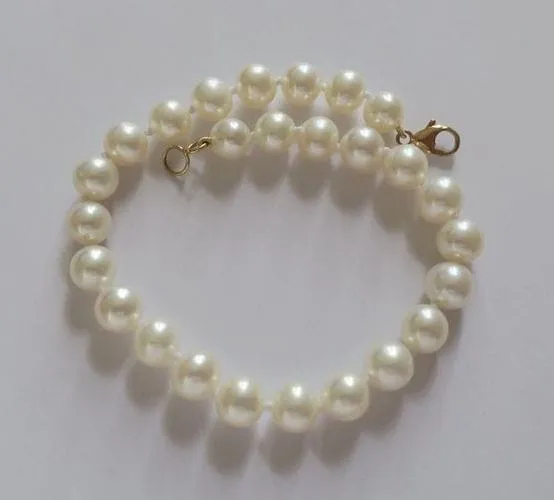 Bracelet choker perles de culture et fermoir menotte en or jaune 18 carats sold by 58 Facettes product image thumbnail 3