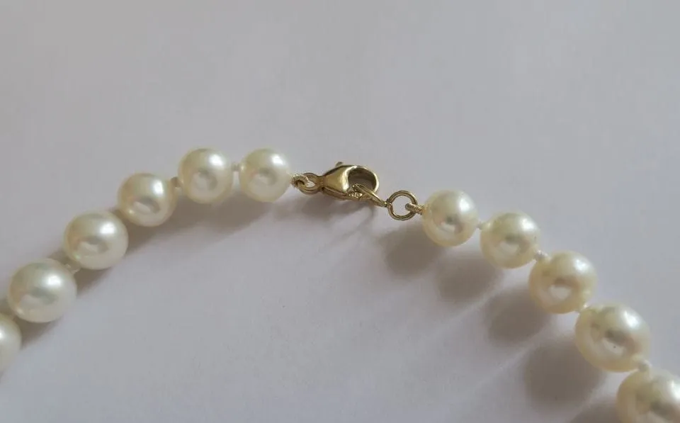 Bracelet choker perles de culture et fermoir menotte en or jaune 18 carats sold by 58 Facettes product image thumbnail 5