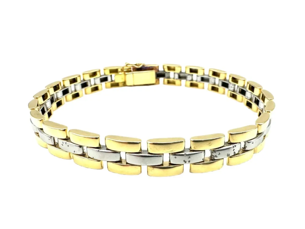 CARTIER. Collection "Panthère", bracelet or jaune et acier (full set) made by 58 Facettes