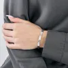 HERMES - Kelly - Petit modèle - Bracelet en or gris et diamants sold by 58 Facettes