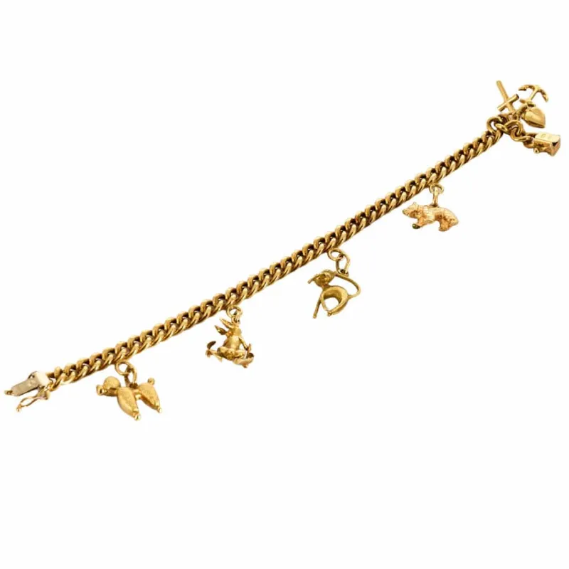 Bracelet souple or jaune et charms sold by 58 Facettes