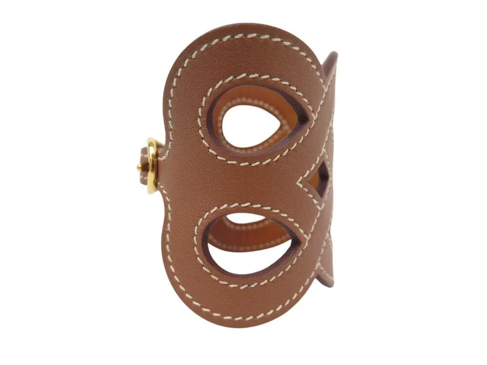 bracelet HERMES manchette entrelacs cuir swift h081205cc37t2 16-17cm sold by 58 Facettes product image thumbnail 5