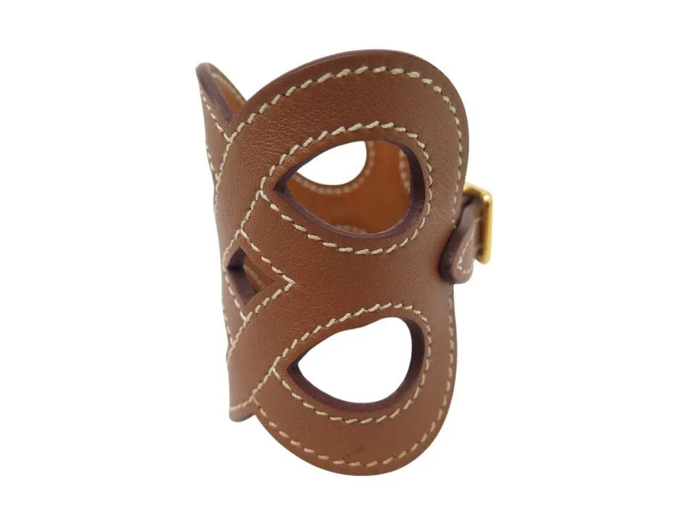 bracelet HERMES manchette entrelacs cuir swift h081205cc37t2 16-17cm sold by 58 Facettes product image thumbnail 3