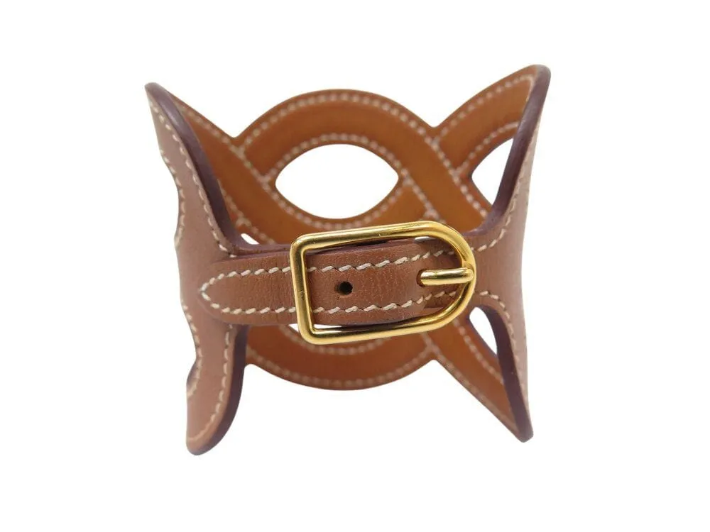 bracelet HERMES manchette entrelacs cuir swift h081205cc37t2 16-17cm sold by 58 Facettes product image thumbnail 4