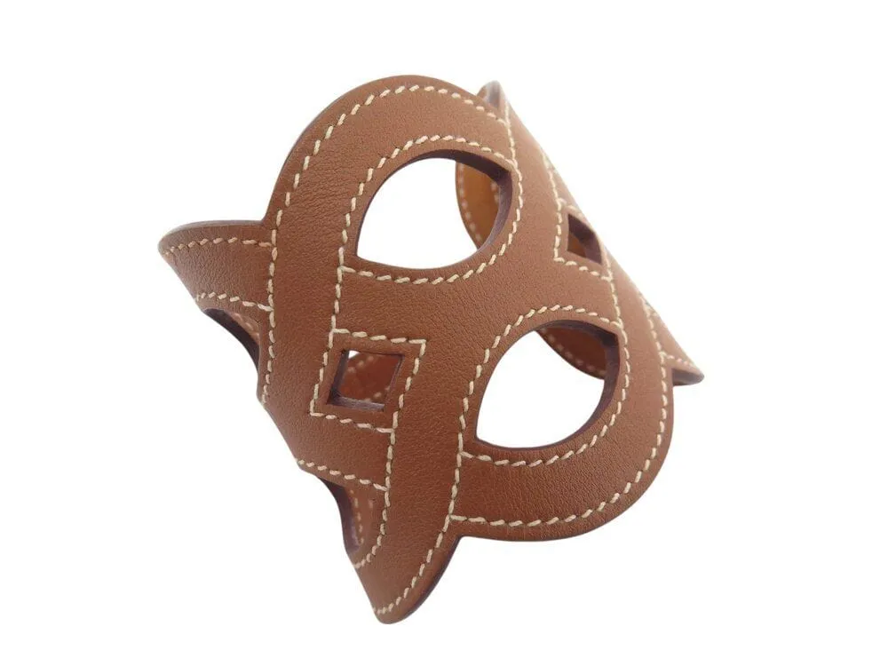 bracelet HERMES manchette entrelacs cuir swift h081205cc37t2 16-17cm sold by 58 Facettes