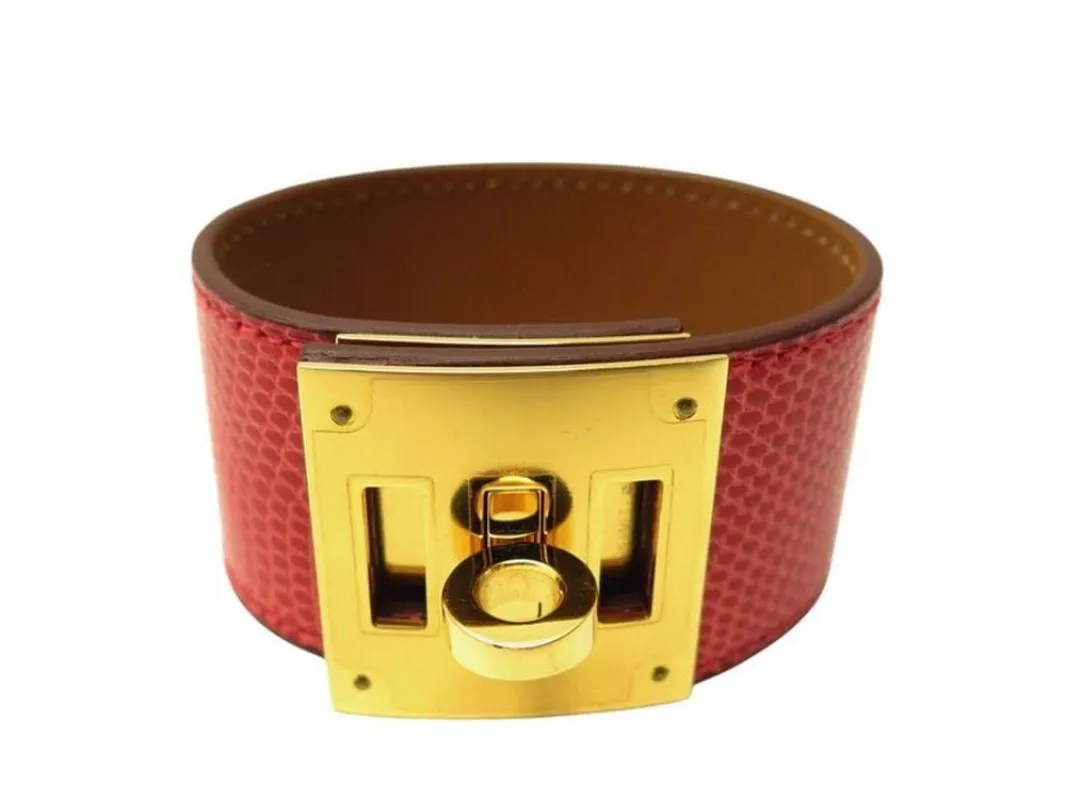 bracelet HERMES kelly chien lézard niloticus t3 15 a 17 métal doré rouge sold by 58 Facettes