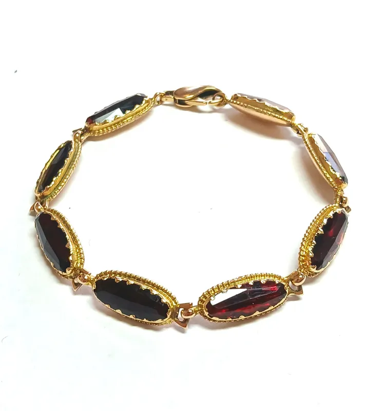Bracelet en or jaune et grenats de Perpignan sold by 58 Facettes