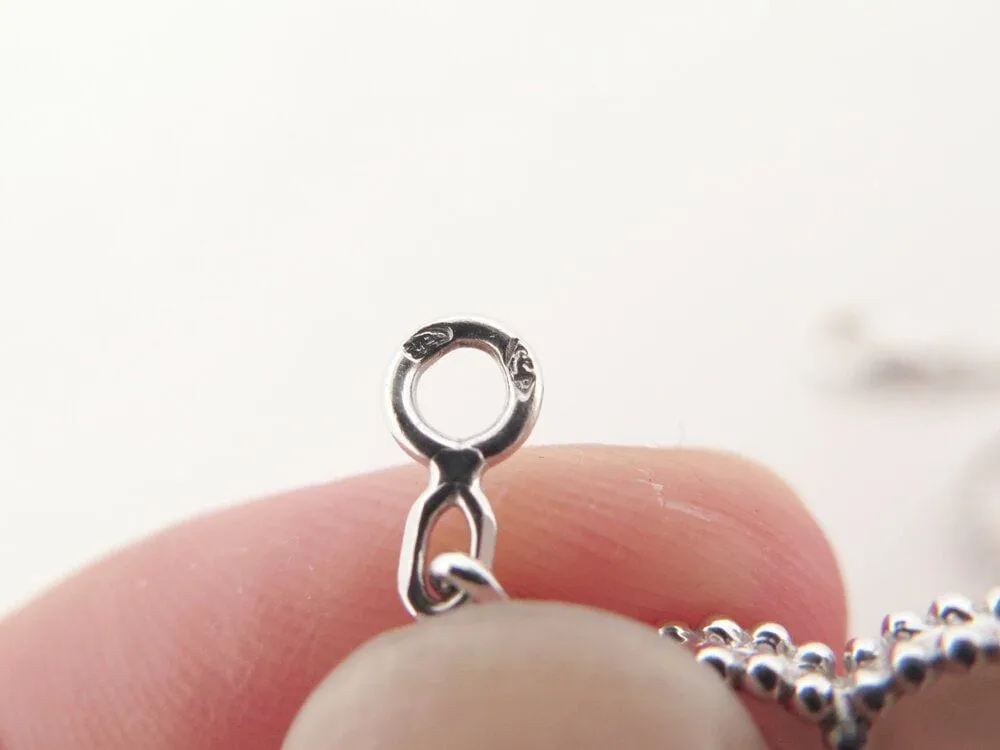 bracelet van cleef and arpels magic alhambra 5 motifs vcarl62400 or nacre sold by 58 Facettes product image thumbnail 5