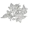 Magnifique broche en or blanc 18K (750 millièmes) issue de la transformation d’un diadème en or blanc et diamants sold by 58 Facettes
