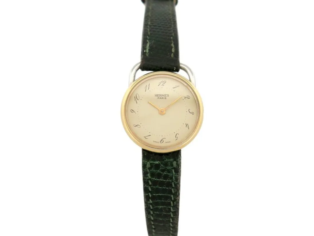 vintage montre HERMES arceau plaque or 25 mm bracelet lezard quartz lady sold by 58 Facettes
