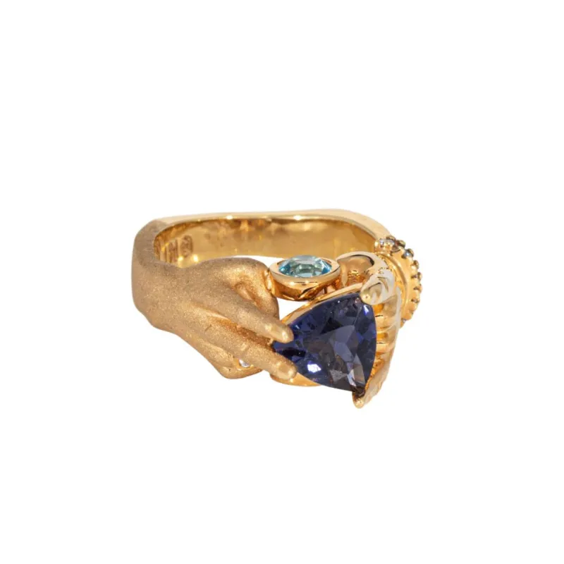 Bague mains en or jaune et topaze tanzanite sold by 58 Facettes