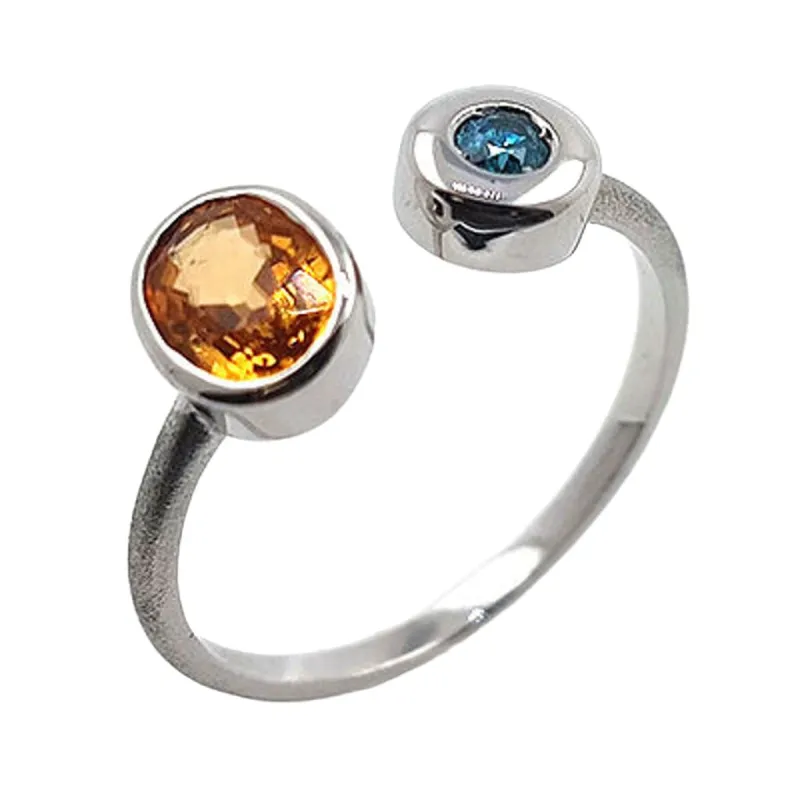 Bague en or blanc avec grenat spessartite et diamant bleu sold by 58 Facettes