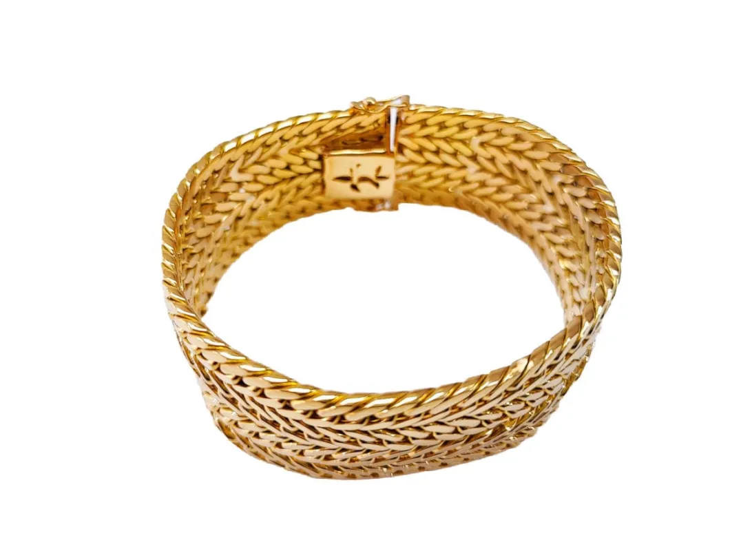 Bracelet manchette en or jaune 18 carats made by 58 Facettes