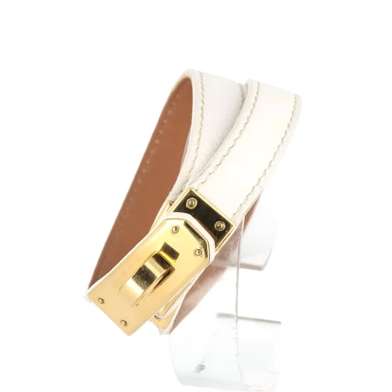 Hermès - Bracelet Kelly plaqué or cuir blanc double tour sold by 58 Facettes
