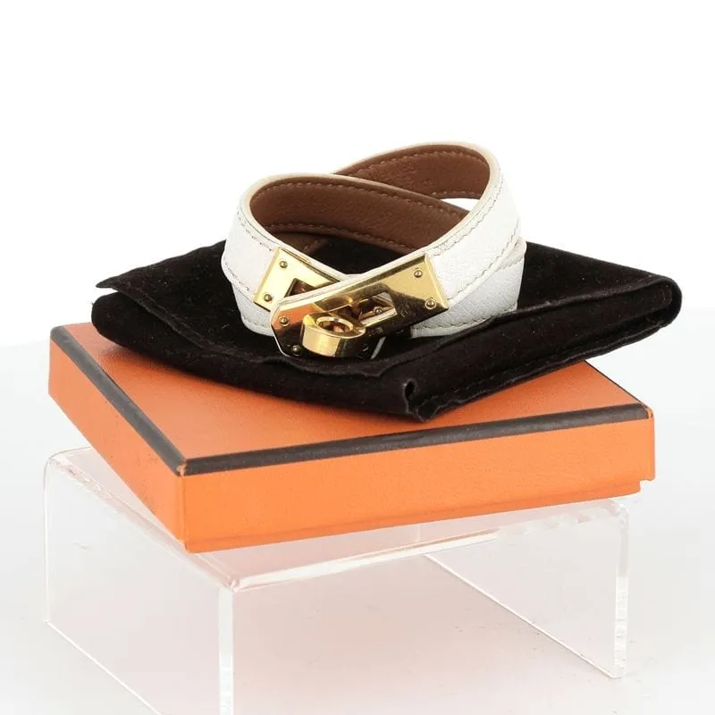 Hermès - Bracelet Kelly plaqué or cuir blanc double tour sold by 58 Facettes product image thumbnail 3