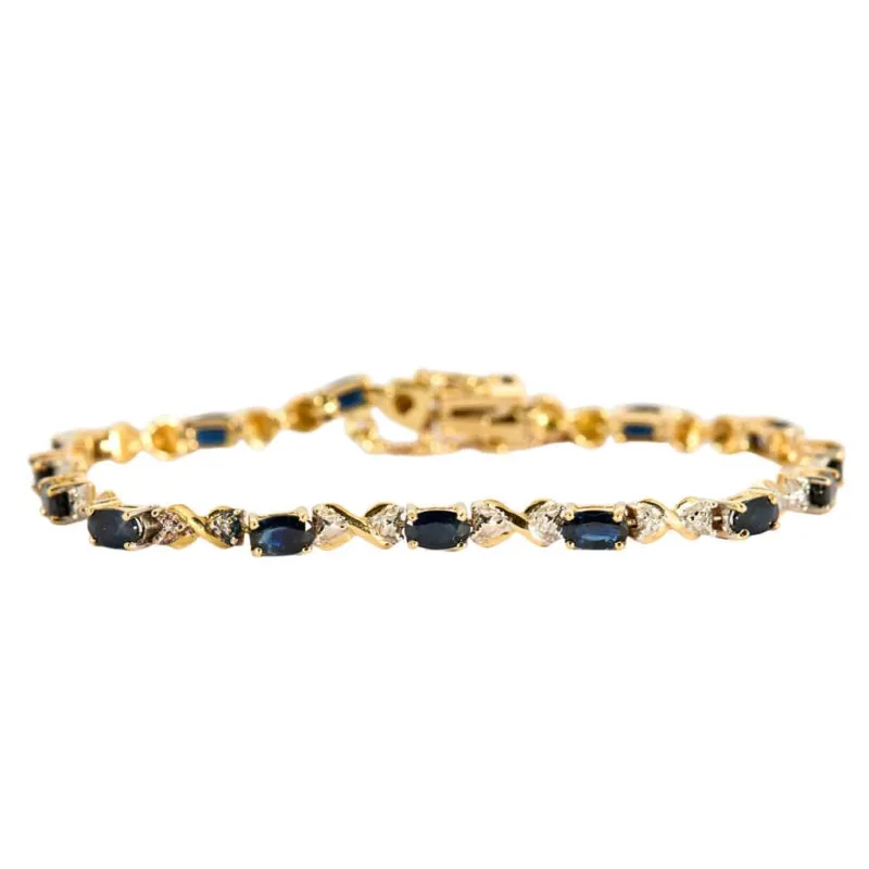 Bracelet Prestige en or jaune, or blanc, saphirs et diamants sold by 58 Facettes
