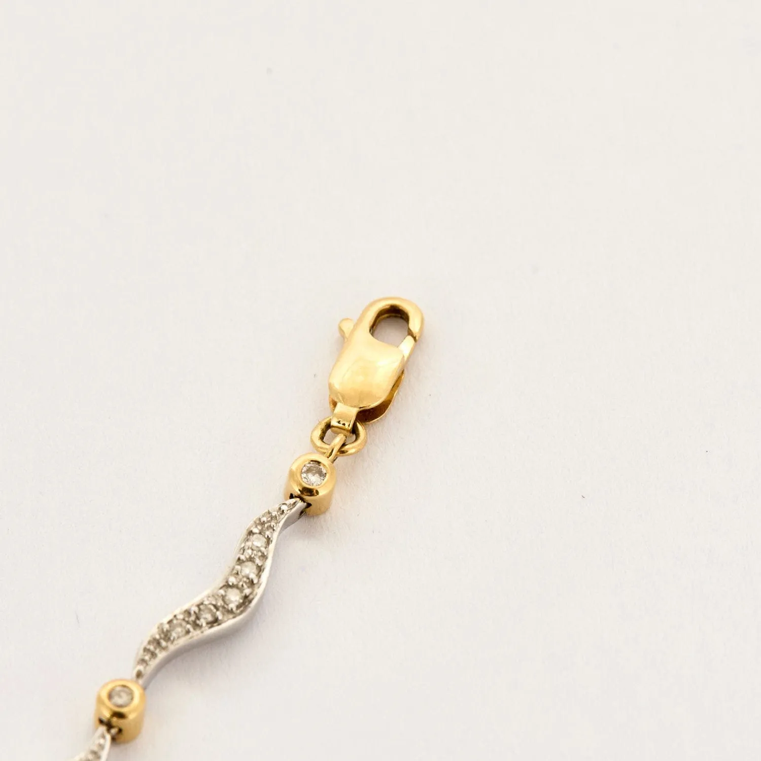 Bracelet en or jaune, blanc et diamants sold by 58 Facettes product image thumbnail 4
