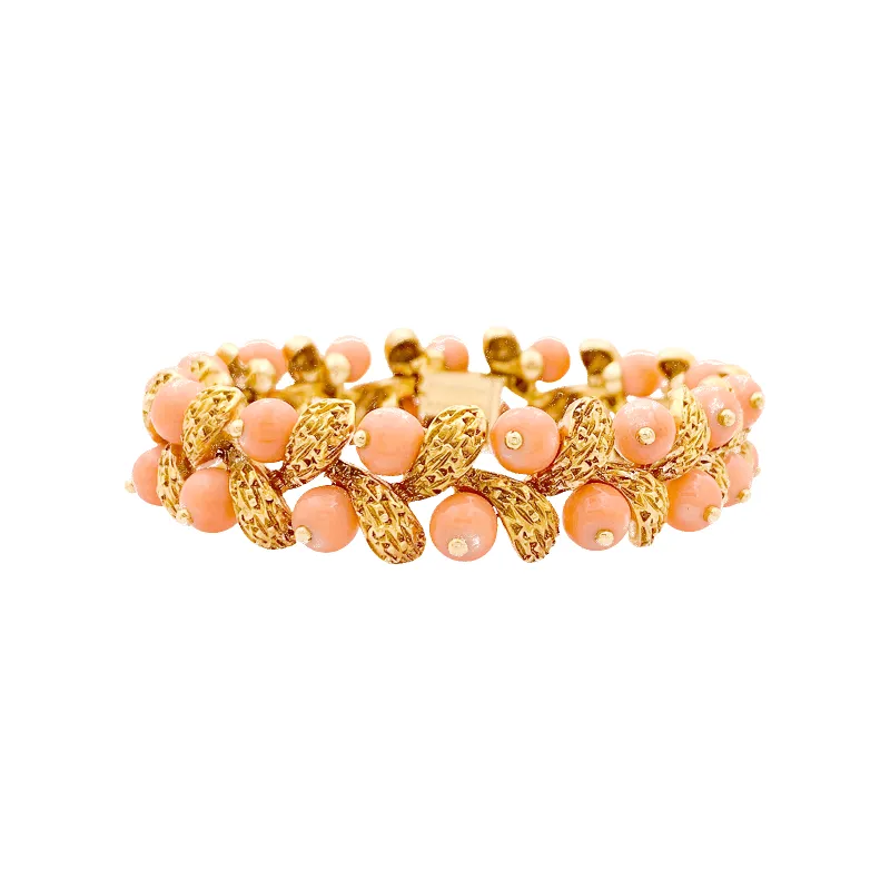 Bracelet Van Cleef & Arpels, "Gui", or jaune, corail peau d'ange. sold by 58 Facettes