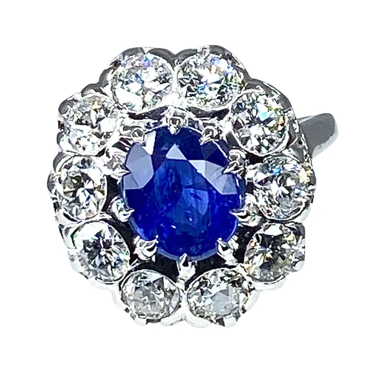 Bague marguerite en or blanc et platine en saphir et diamants sold by 58 Facettes