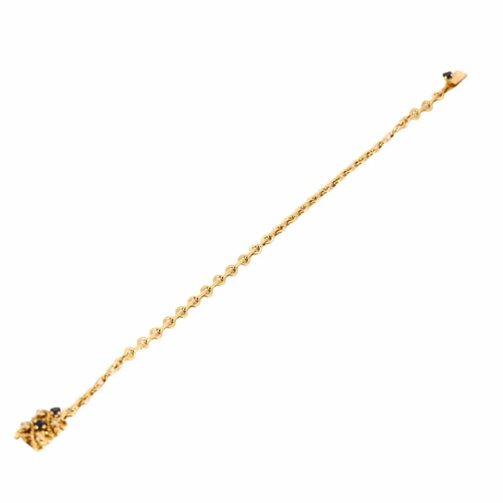 Bracelet torsadé en or jaune saphir et diamants. sold by 58 Facettes