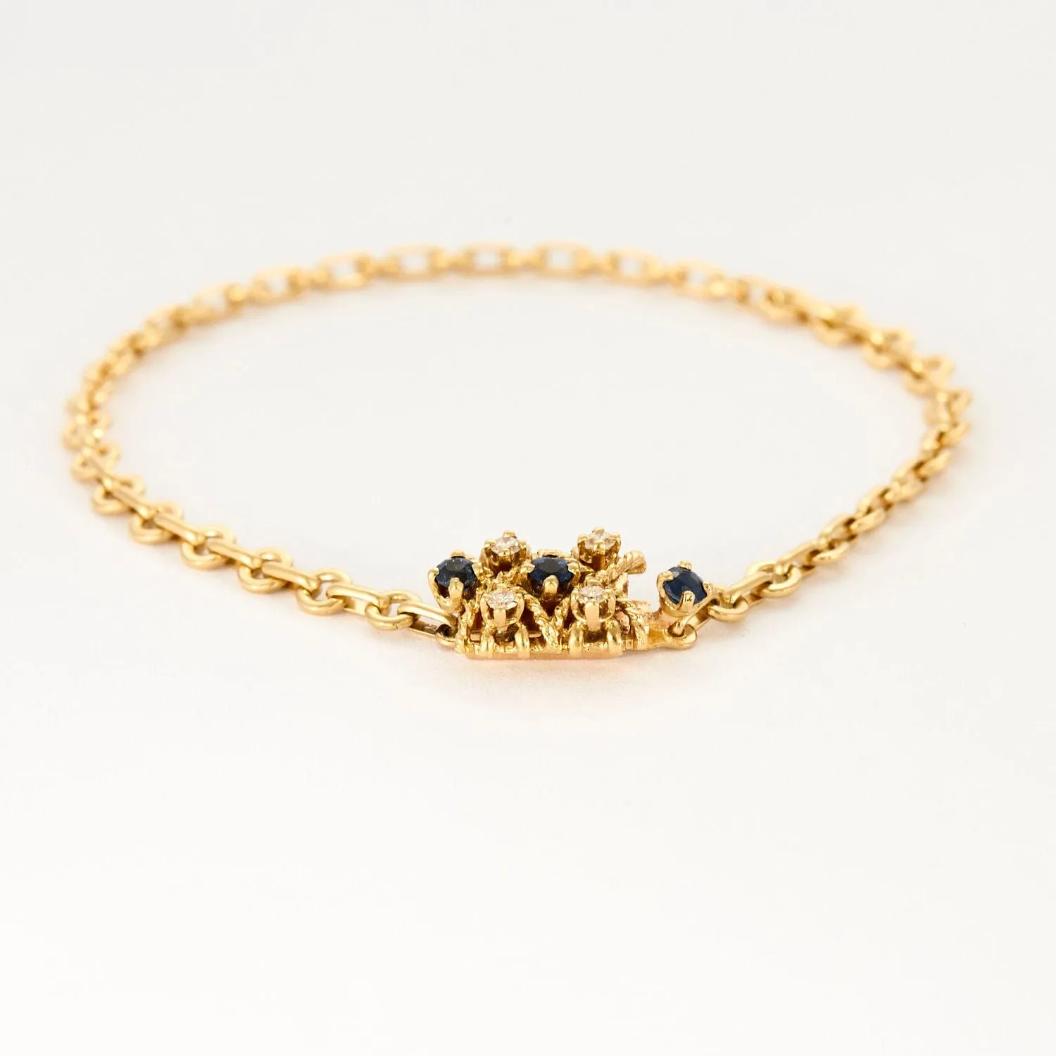Bracelet torsadé en or jaune saphir et diamants. sold by 58 Facettes product image thumbnail 2