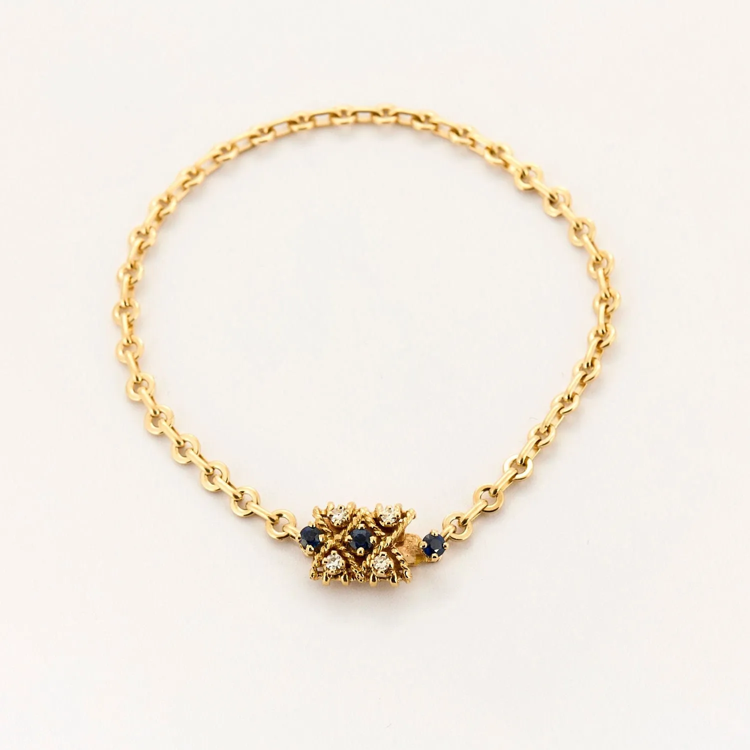 Bracelet torsadé en or jaune saphir et diamants. sold by 58 Facettes product image thumbnail 3