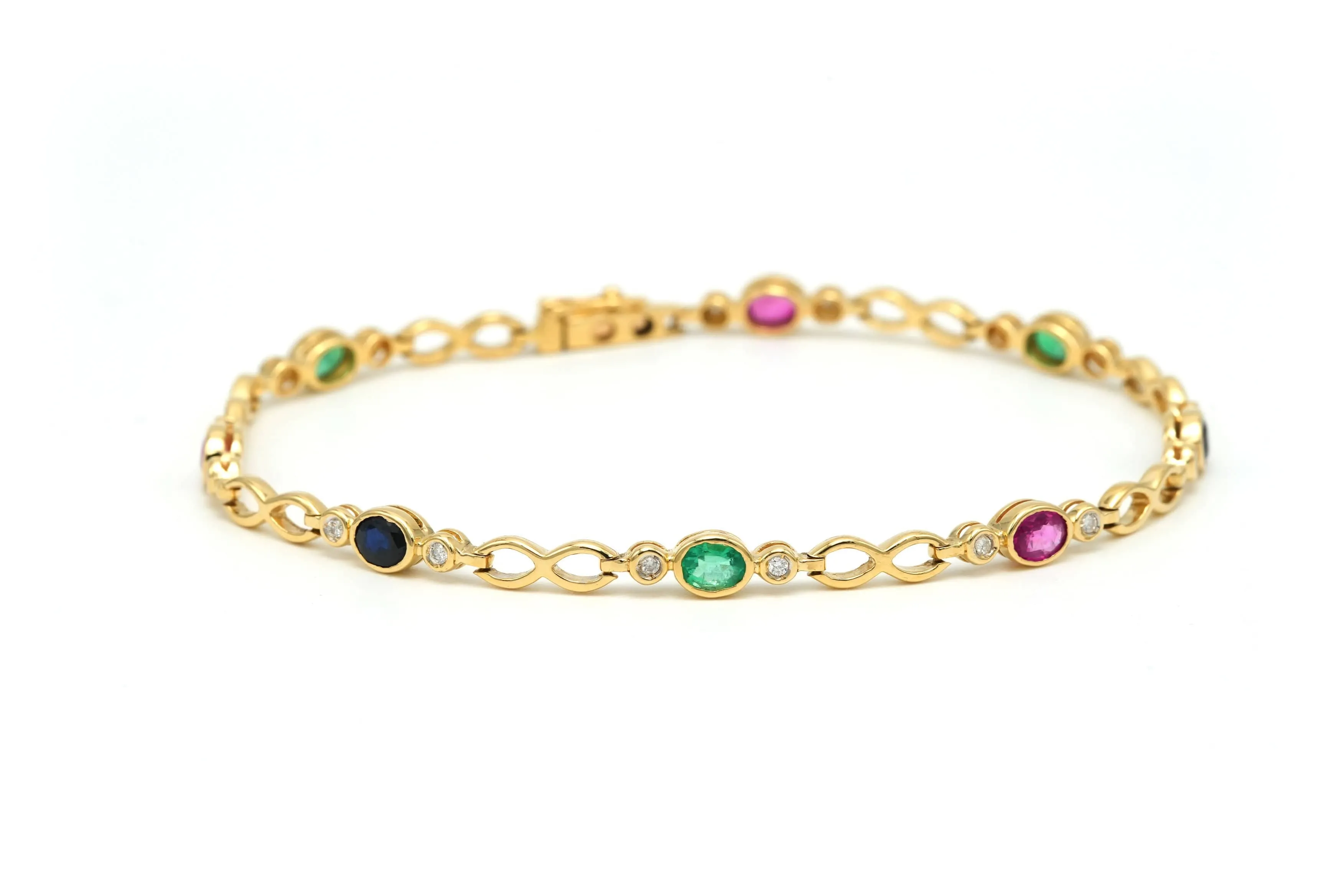 Bracelet en or jaune serti d'émeraudes, de rubis, de saphirs et de diamants sold by 58 Facettes