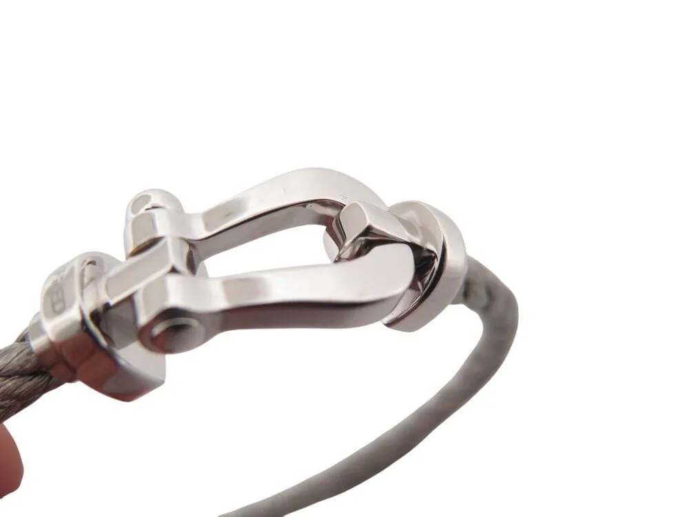 bracelet FRED force 10 mm manille or blanc 18k cable acier t16 18cm sold by 58 Facettes product image thumbnail 5