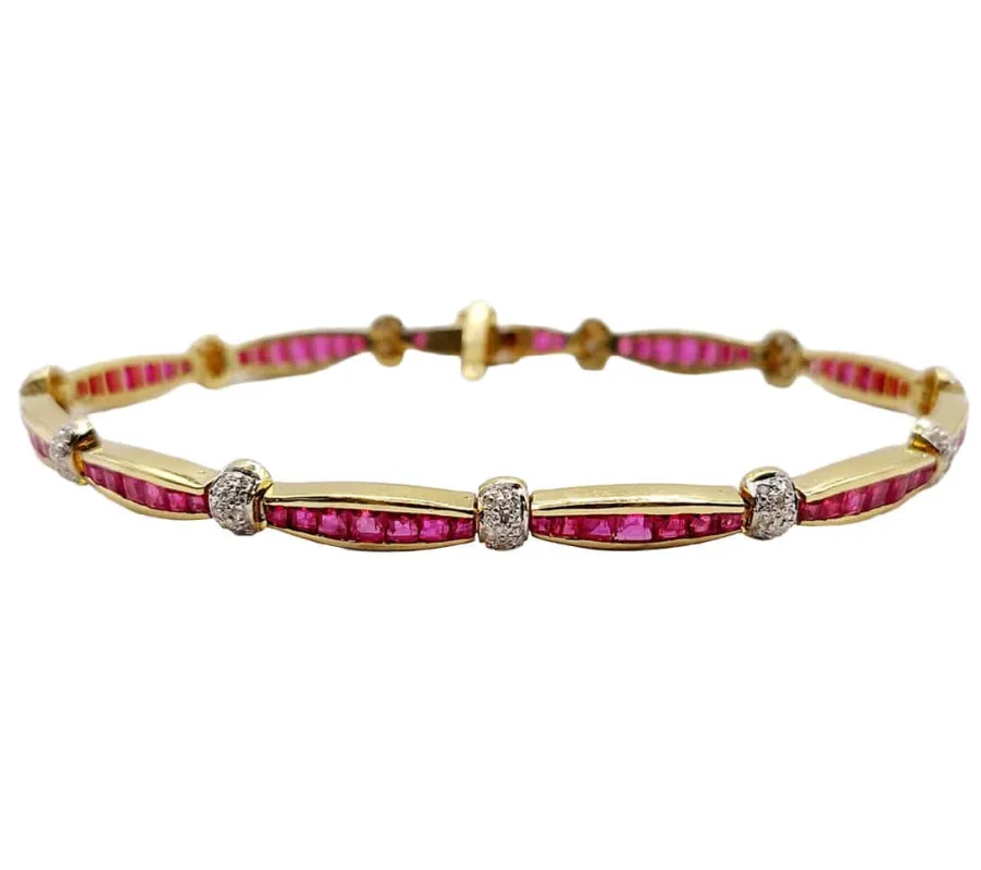 Bracelet Art déco or jaune, rubis calibrés synthétiques et diamants sold by 58 Facettes