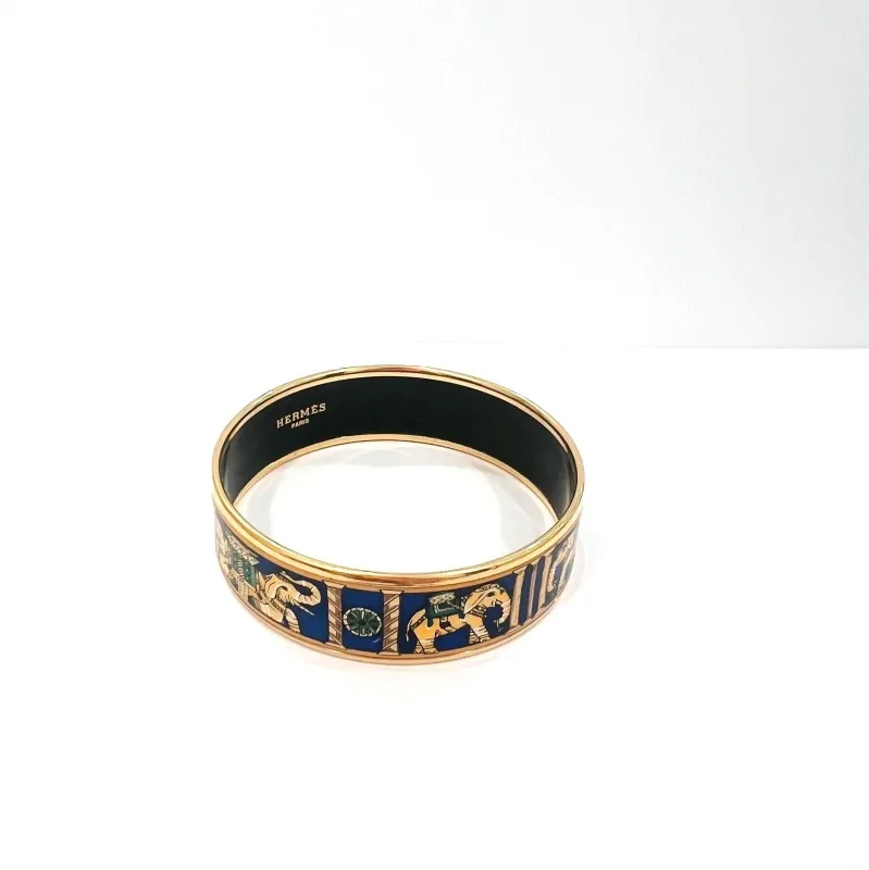 HERMÈS - Bracelet en métal doré et émail bleu modèle TORANA sold by 58 Facettes