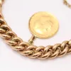 Bracelet maille en or massif 18 carats avec pièce de monnaie sold by 58 Facettes